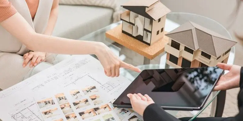 client and contractor discussing about home remodeling