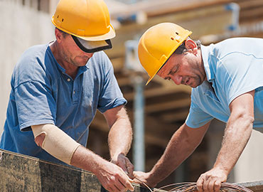 Two contractors working on a project