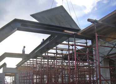 Contractors working on the installation of a roof