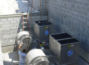 Contractor working on installing BAC A/C system