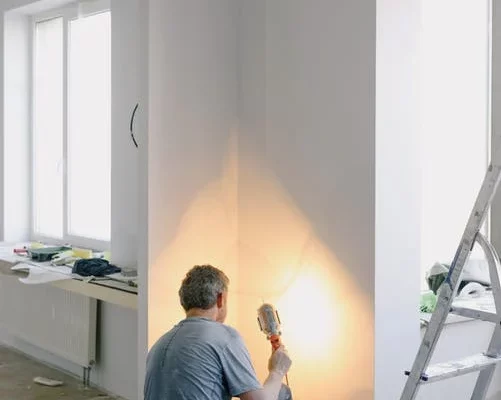 man working in a room