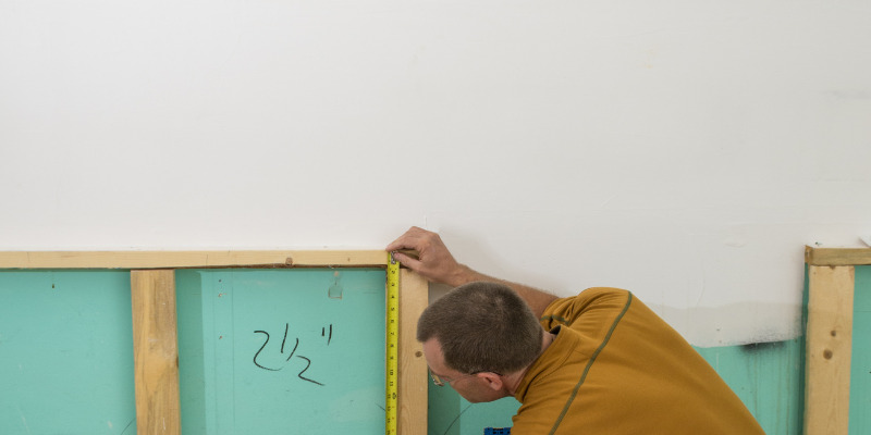 Worker preparing for kitchen remodeling