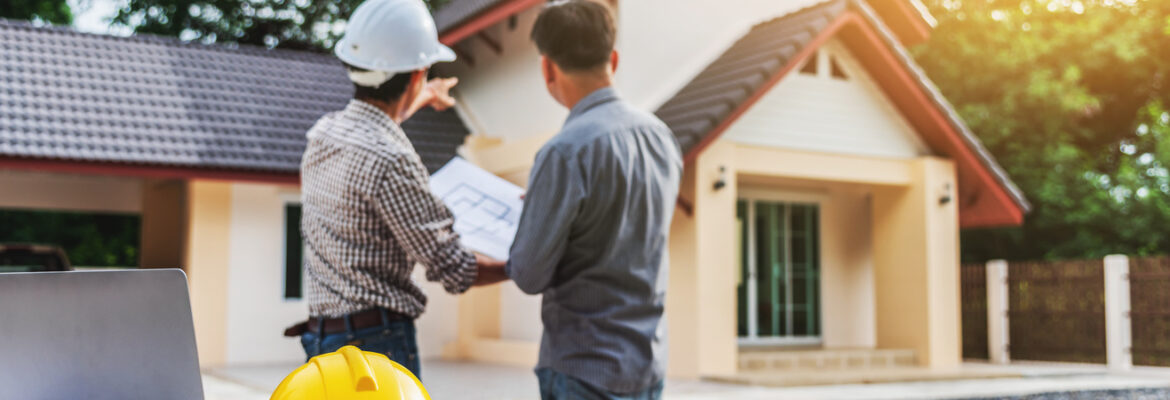 Two business man professional construction contractor at the house building