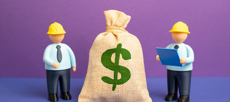 Engineers and a dollar bill. Project budget. Financial planning supports engineering decisions. Cost estimation and resource allocation ensure project efficiency